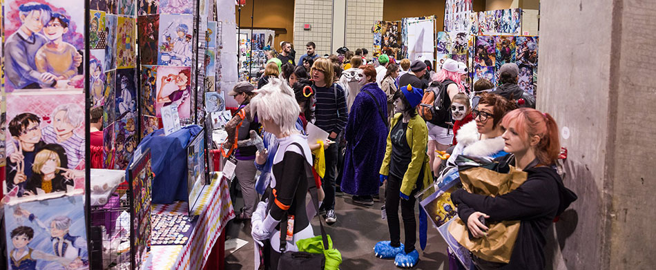 Attendees enjoying the artist & vendor room