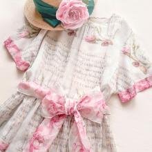 white dress with pink trim